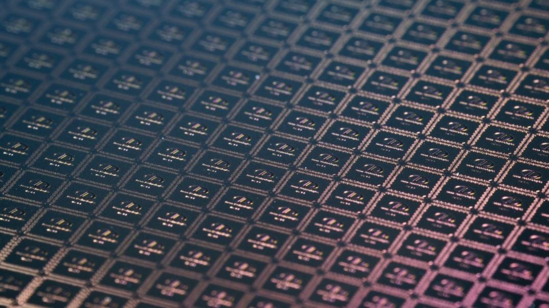 An electronic wafer produced by semiconductor company Deca Technologies, which is based at the ASU Research Park in Tempe