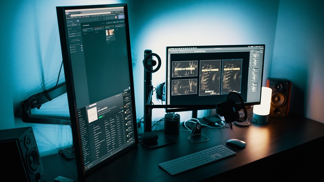 A desktop is shown with horizontal and vertical screens.  