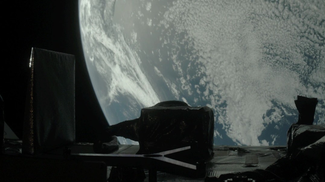 On the left, this image shows SamCam, provided by the U of A to track the spacecraft’s sample head during its primary mission. The Y-shaped sample return capsule release mechanism is visible in the center in its deployed position. The OSIRIS-REx Laser Altimeter, provided by the Canadian Space Agency to create detailed 3D topographical maps of Bennu, is behind the release mechanism. To the right, one of the spacecraft's two navigation cameras, or NavCams, is visible.