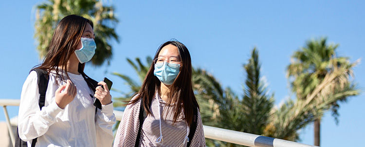 Two ASU students in face masks