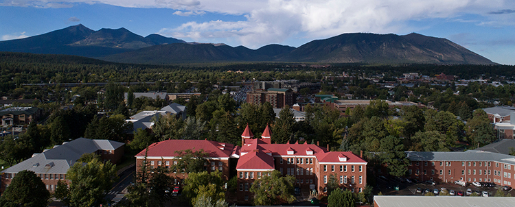 Overview photo of NAU campus with San Francisco Peaks in the background 